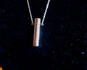 An Other Worldly Necklace Of A Kaleidoscope With Real Gemstones Inside