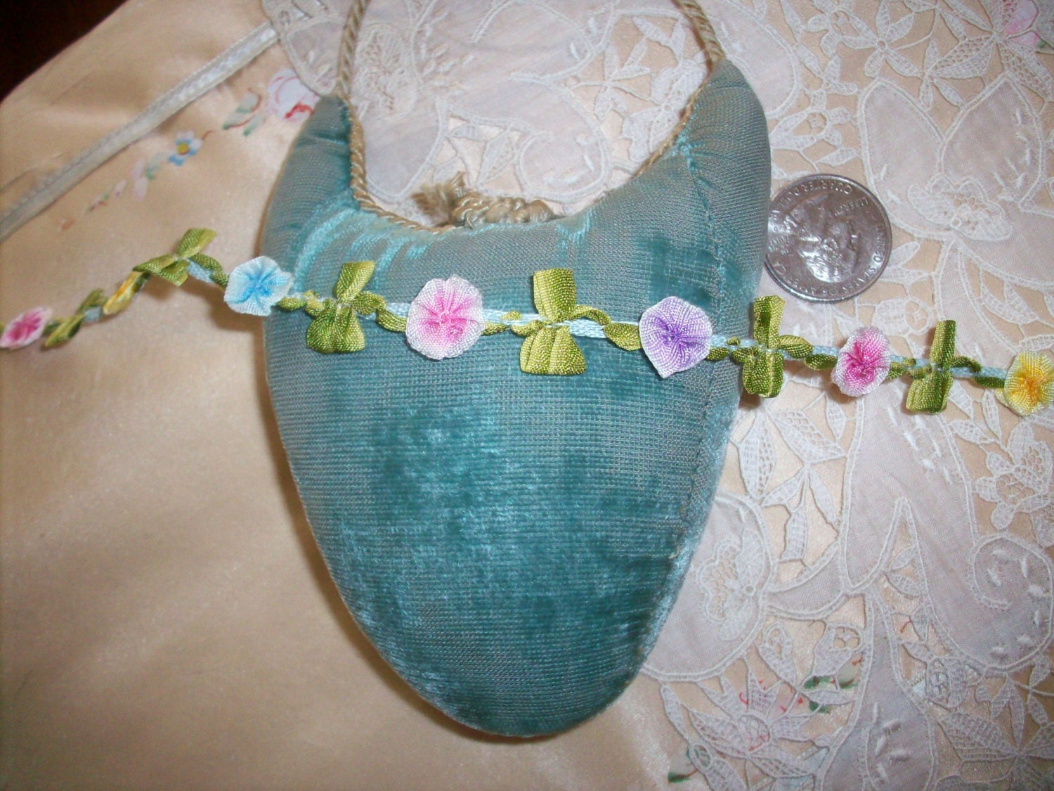 1 yd. of a vintage multicolored ribbon work garland