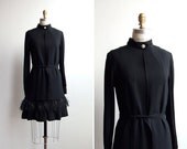 Vintage 1960s designer crepe dress with ostrich feather hem