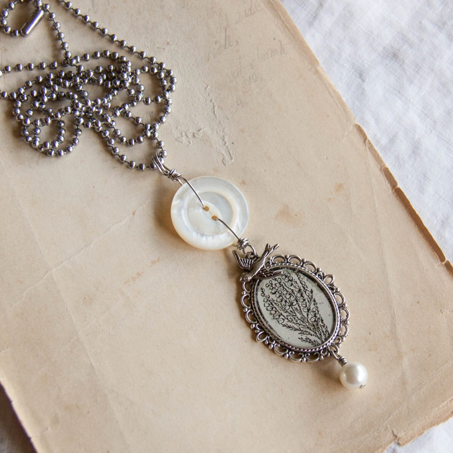 vintage 1950s dictionary heather plant illustration, vintage button, bird charm, repurposed pearl / heather necklace