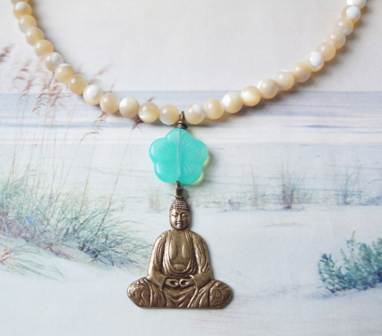 Sitting Buddha Aqua Pressed Glass Flower Serenity Zen Necklace