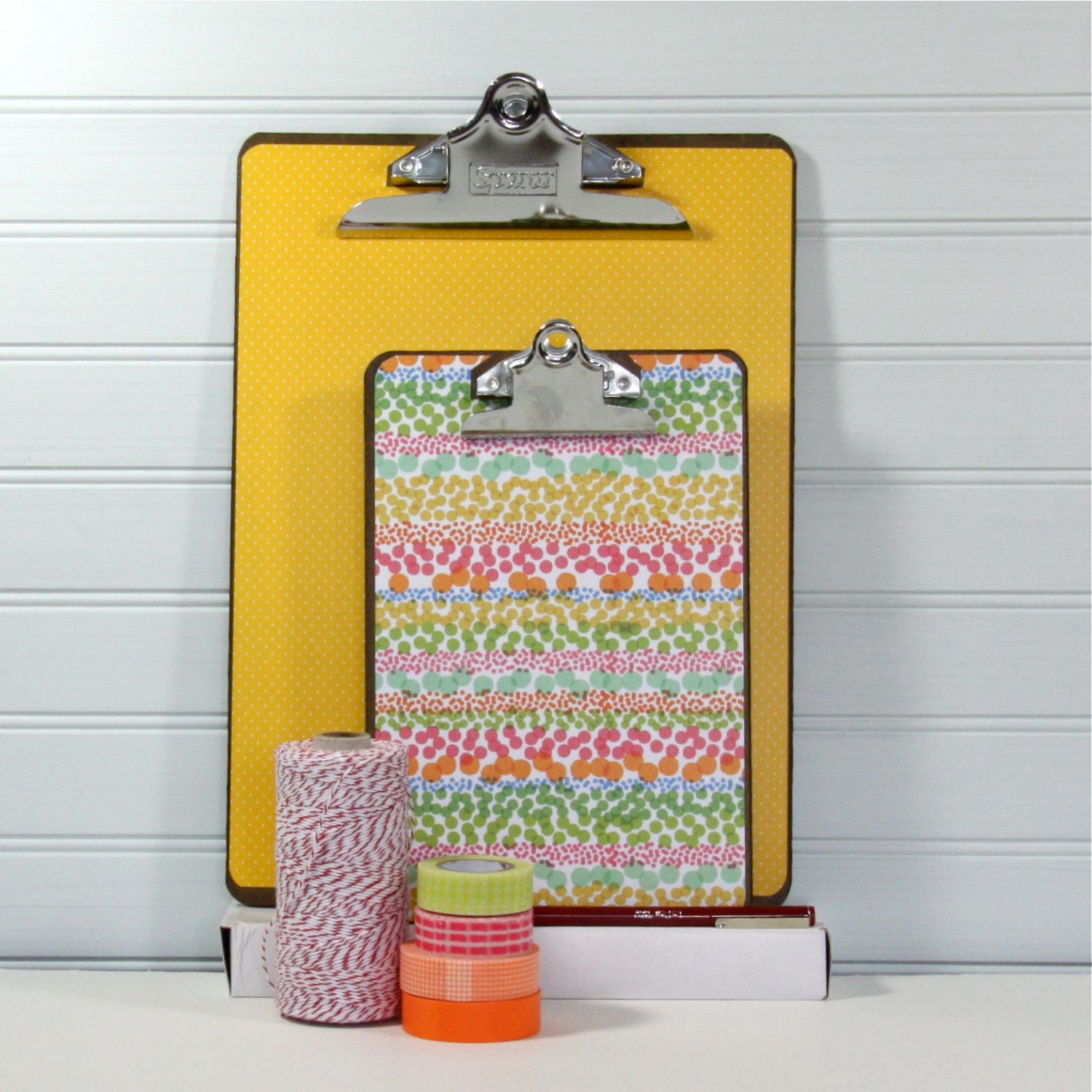 Papered Clipboards.  Mixed Letter and Journal Sized.  Yellow and Pink.