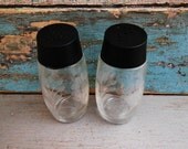 Clear Glass Black Tops Etched Flowers Salt and Pepper Shakers Vintage