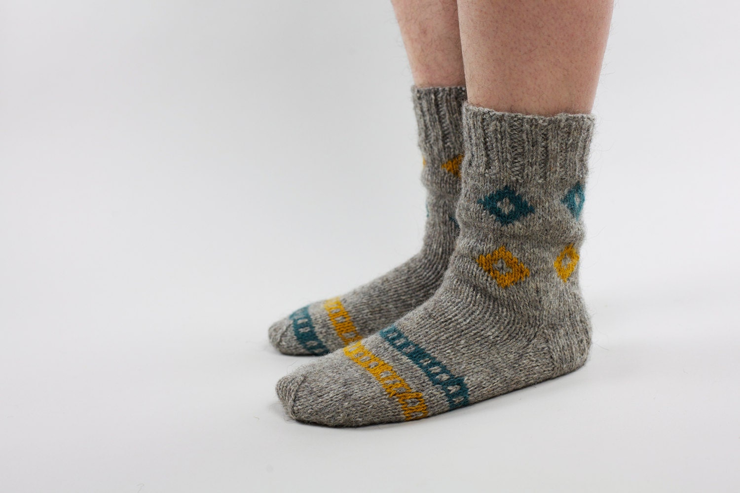 Hand knit natural grey  wool socks with triangle folk motives
