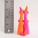 Gemini Birthday Cake Topper - Neon Pink and Orange Ferret Twins by Bonjour Poupette