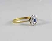 Antique Sapphire Engagement Ring with Diamond Halo, Circa 1910s.