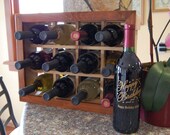Eco Friendly wooden wine rack with stained frame. Handmade in USA from recycled cedar