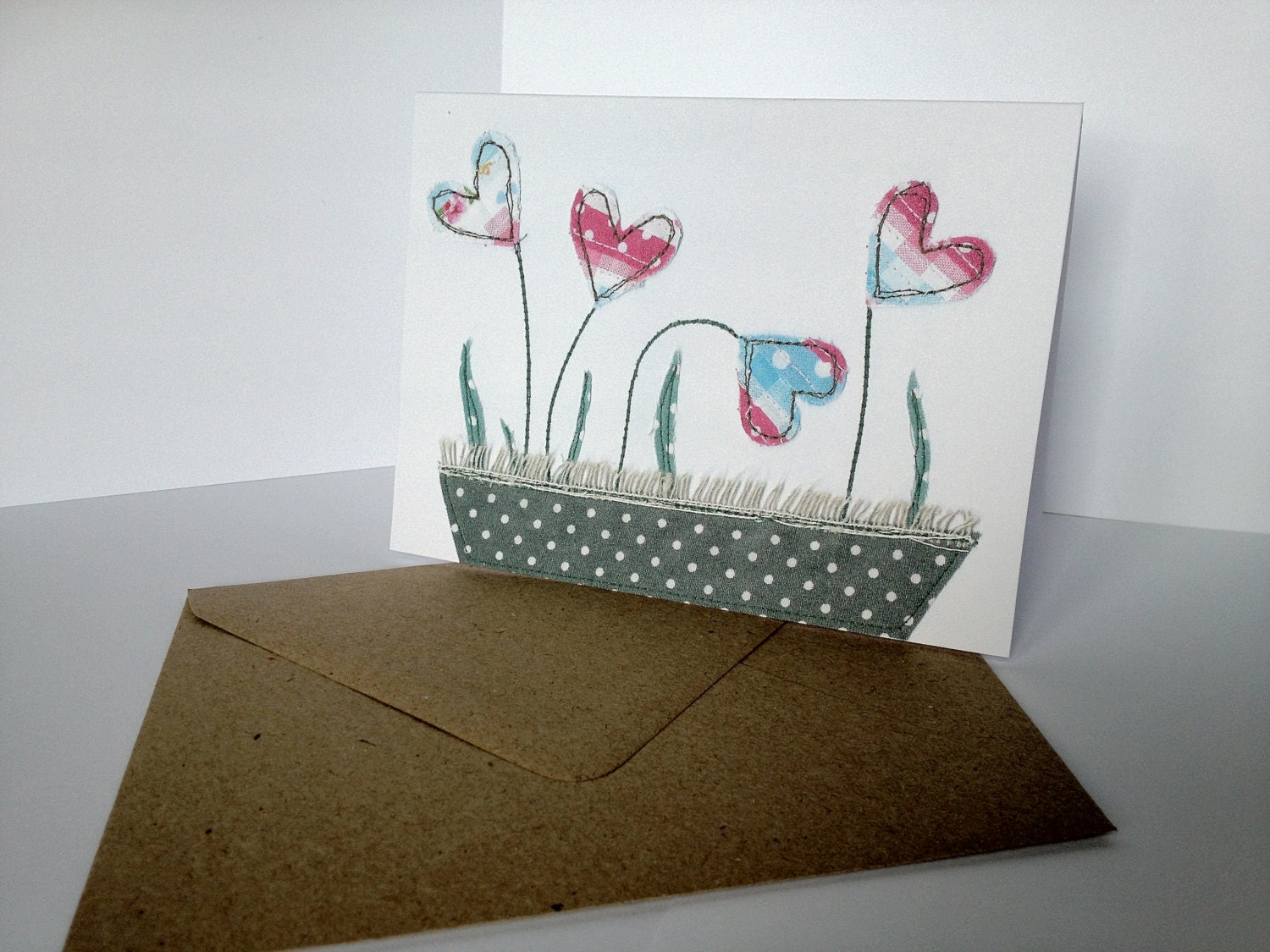 Lovely polkadot heart flowers in a windowbox greetings card - textile design