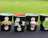 Tumbler with changeable charm