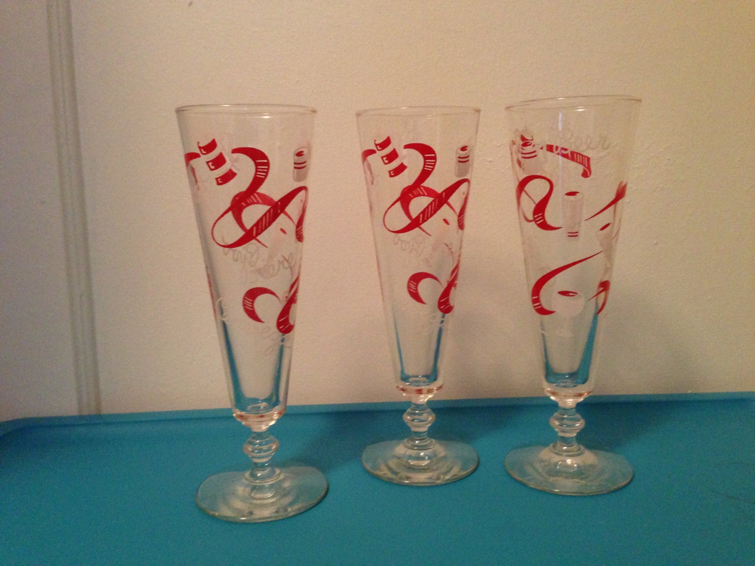 Set of three vintage beer glasses