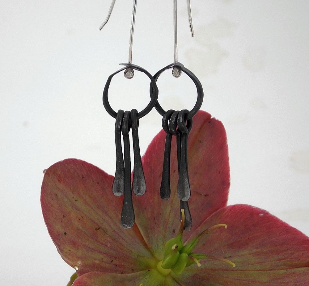 steel and silver earrings