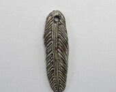 Handmade ceramic feather pendant