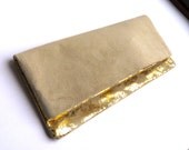 Leather and suede foldover clutch purse in metallic gold and cream