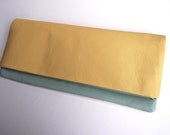Foldover leather clutch bag in lemon and baby blue