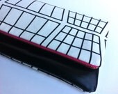 Limited edition multi style leather clutch bag with monochrome print fabric