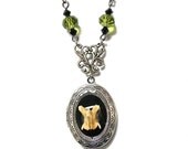 Steampunk Necklace Animal Bones Locket  by:Mechanique Steampunk