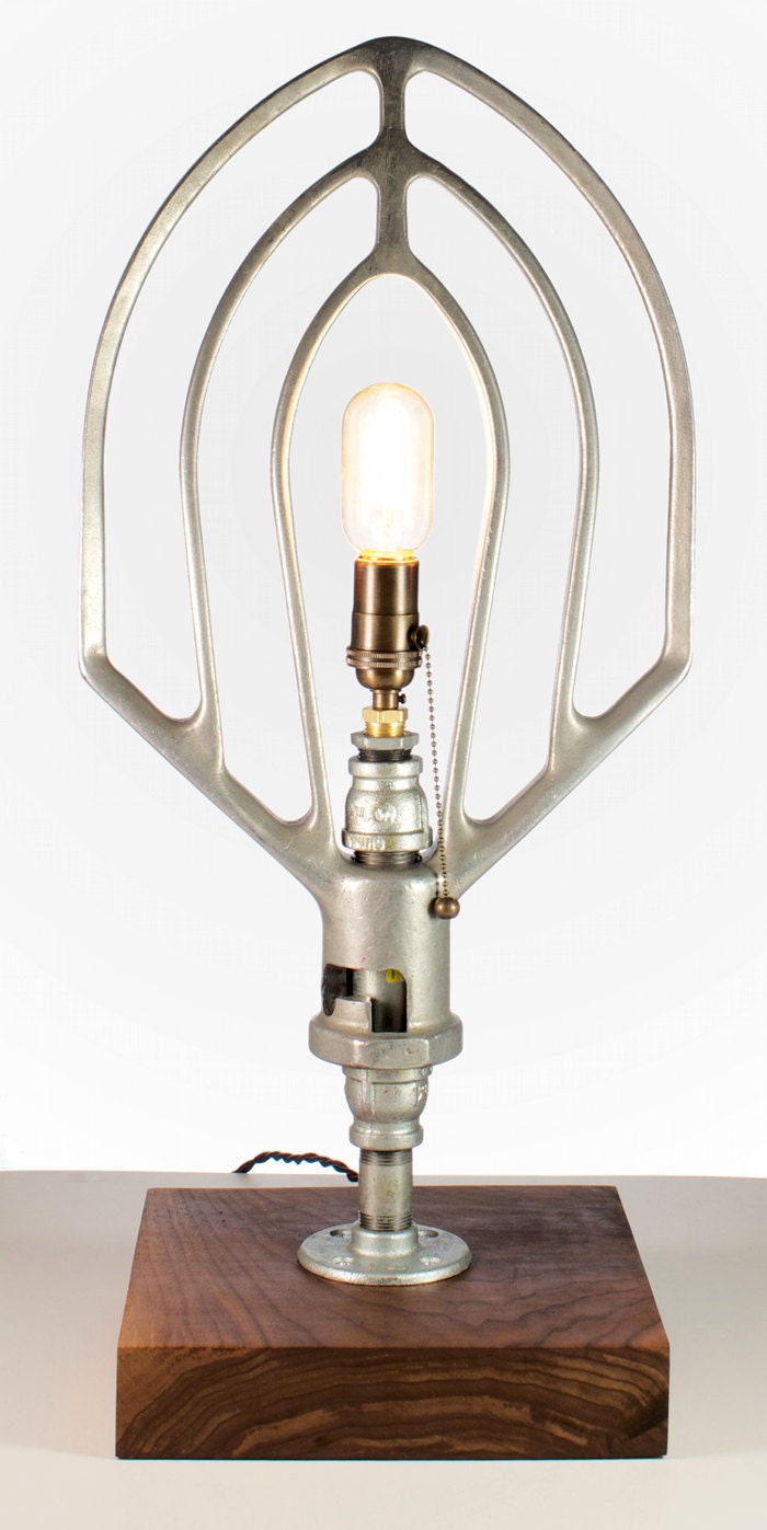 Desk Lamp: Commercial beater mixing attachment mounted on a black walnut base truely one of a kind conversation piece