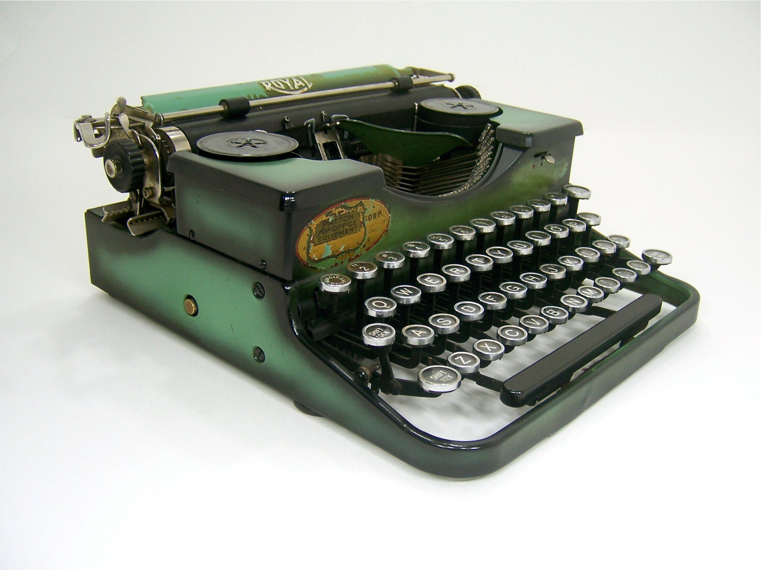 Vintage typewriter in green and black for library, office, home decor, poet, writer or author gift idea. Antique Royal Portable with case.