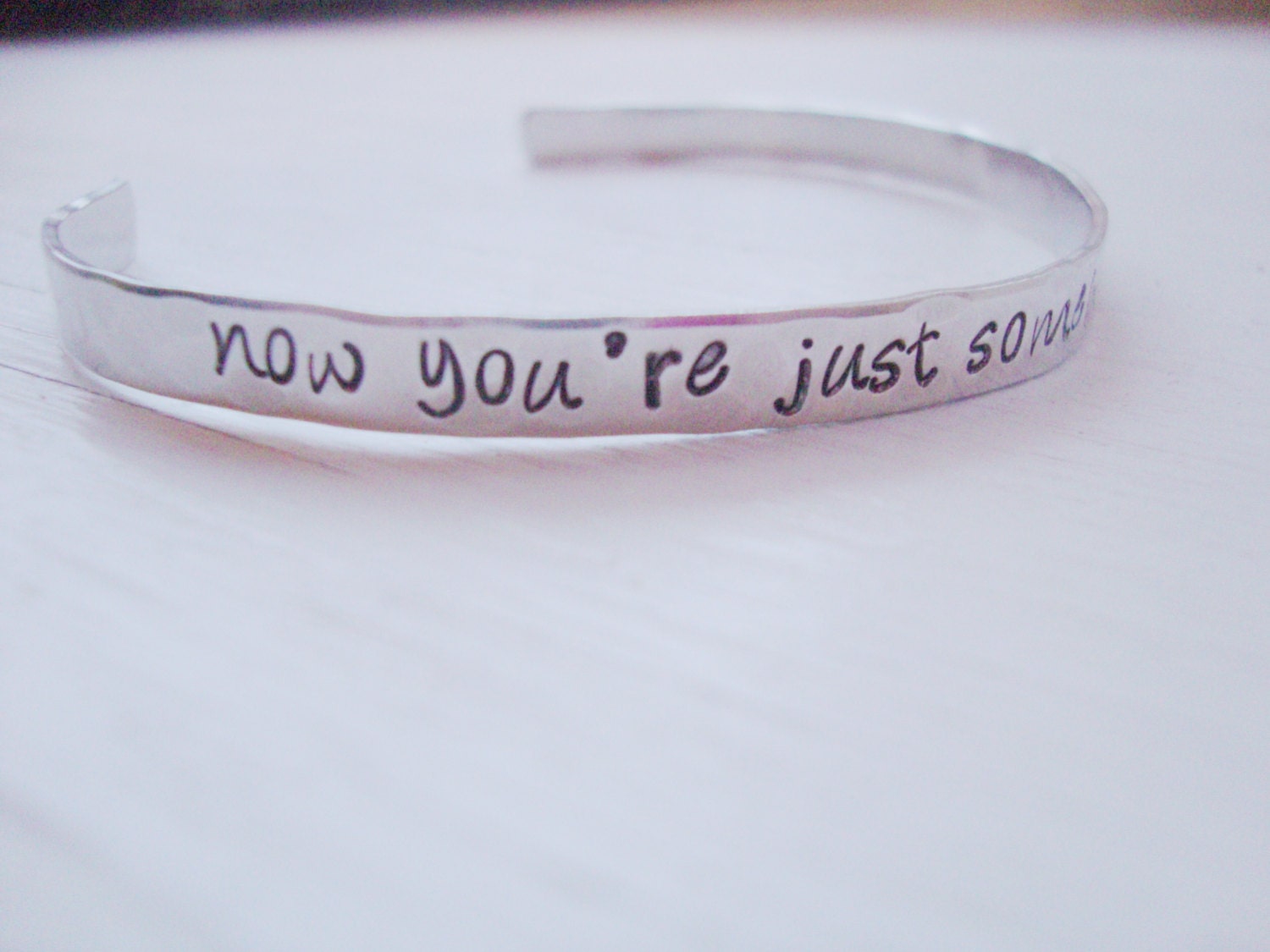 Somebody that I used to know hammered hand stamped silver dainty cuff