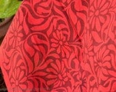 Hand block print cotton fabric. Dramatic red and brown floral.