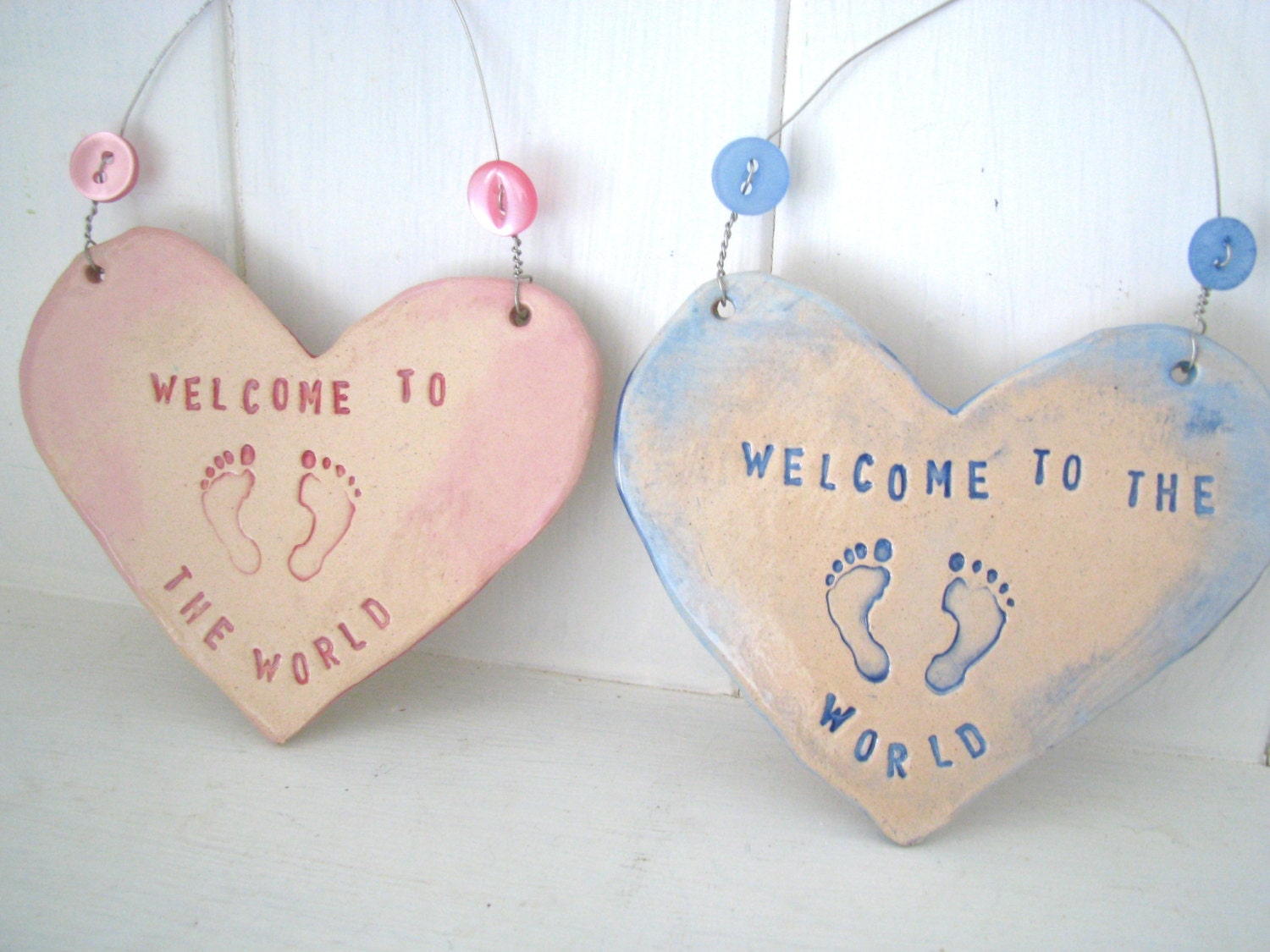 Welcome to the World. Baby footprints. New Baby arrival gift. Ceramic. Blue /pink. Made in Wales, UK