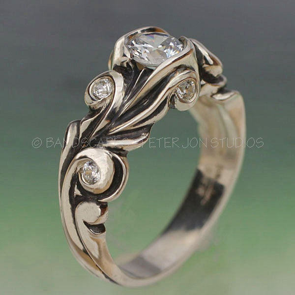 The ANNE WEDDING RINGS Set in 14k White , Yellow, or Rose gold . Engagement ring and matching wedding band.