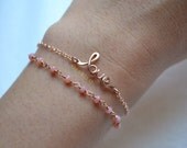 cursive LOVE bracelet Rose gold