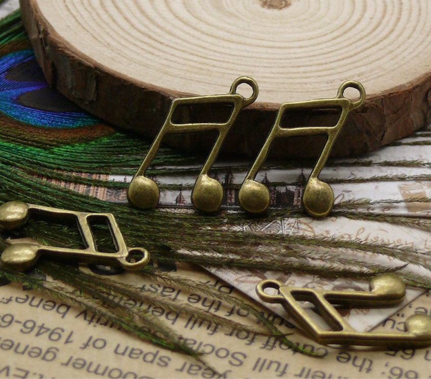 20 pcs of Antiqued  brass musical note pendant  10x22mm jewelry findings