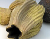 Carved porcelain pod in tan, brown and green with gold luster