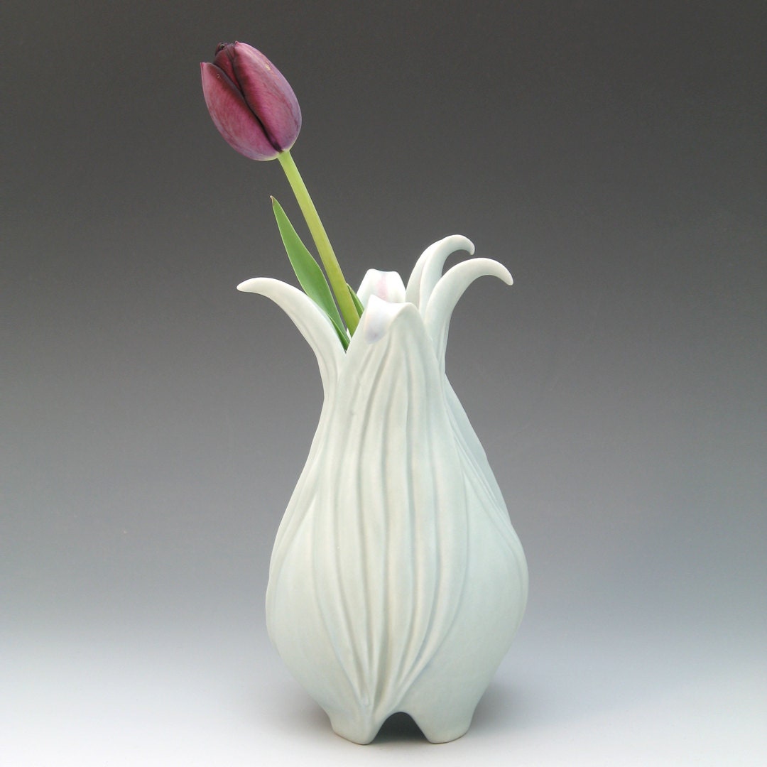 Carved porcelain pale blue vase
