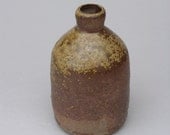Small stoneware vase with reduced ash