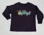 Toddler Size 3T dark purple batik tshirt.