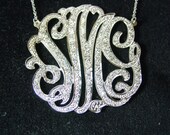 sterling silver monogram , 2" size ,  with 100cz pave' set.