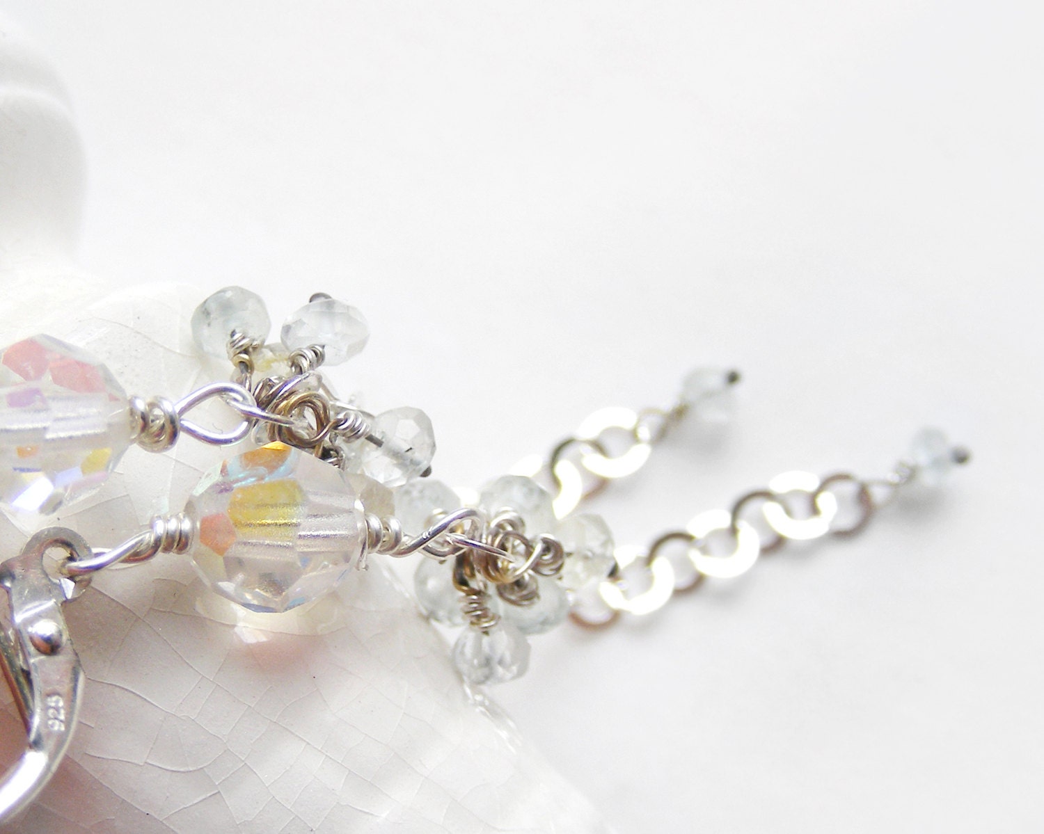 Long sterling silver earrings with natural aquamarine and mountain quartz as gemstone cluster earrings