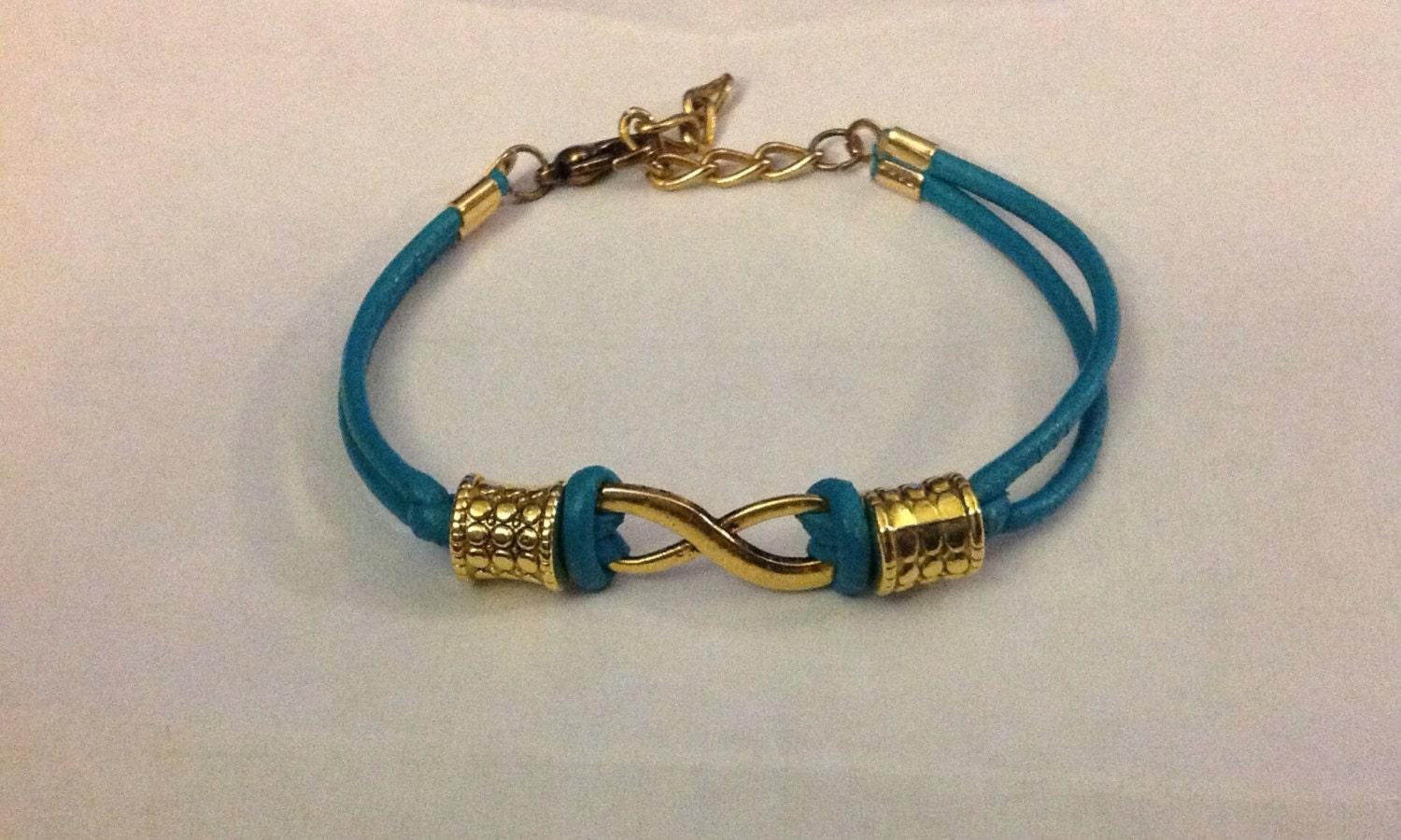 Gold Infinity & turquoise bracelet w beads