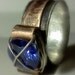 Two tone ring, Copper and Silver band, wire wrapped tanzanite colored stone