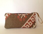 ZIPPER CLUTCH from upcycled upholstery swatches - fabric and leather