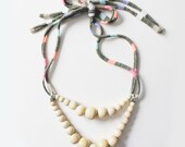Color Pop Necklace in Vanilla & Color Stripe . Non-toxic Beads with a Jersey Tie . Fashionable and baby-friendly