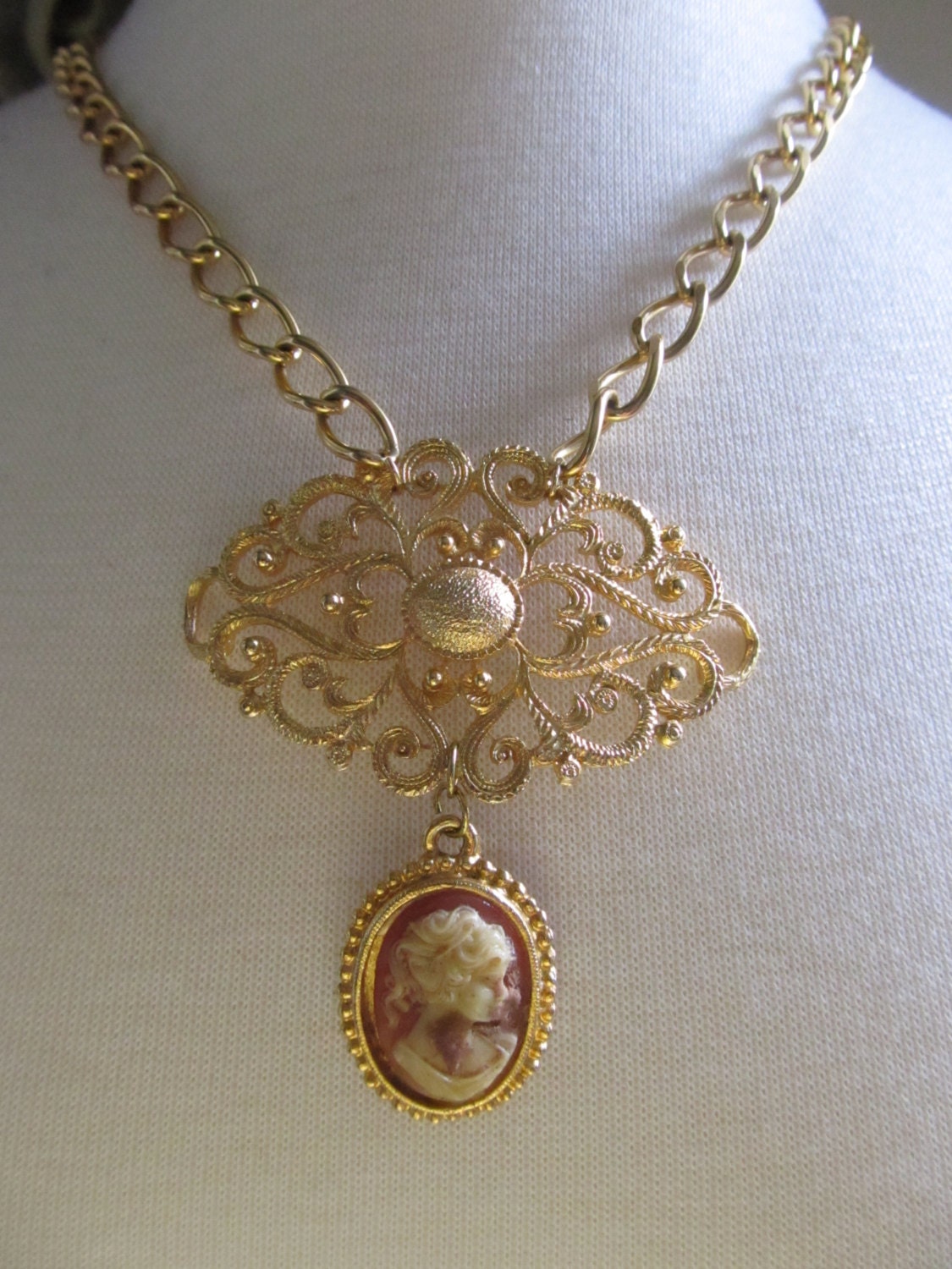 Necklace--Gold Flourish Medallion with Cameo Pendant. Handcrafted Jewelry by ConfettiStyle Designs as featured in Country Living Magazine.
