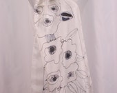 Silk scarf, hand painted in black and white with floral patterns.