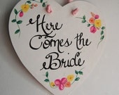 Heart Shaped Here Comes the Bride sign with ribbon