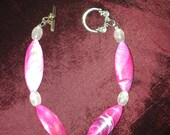 Pink Pillars: Handmade Shell Bead Bracelet