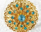 Vintage Starburst Brooch / Pin, Blue Rhinestones / Crystals, Ornate Gold Tone Filigree, Designer CORO, 1950s Mad Men Jewelry
