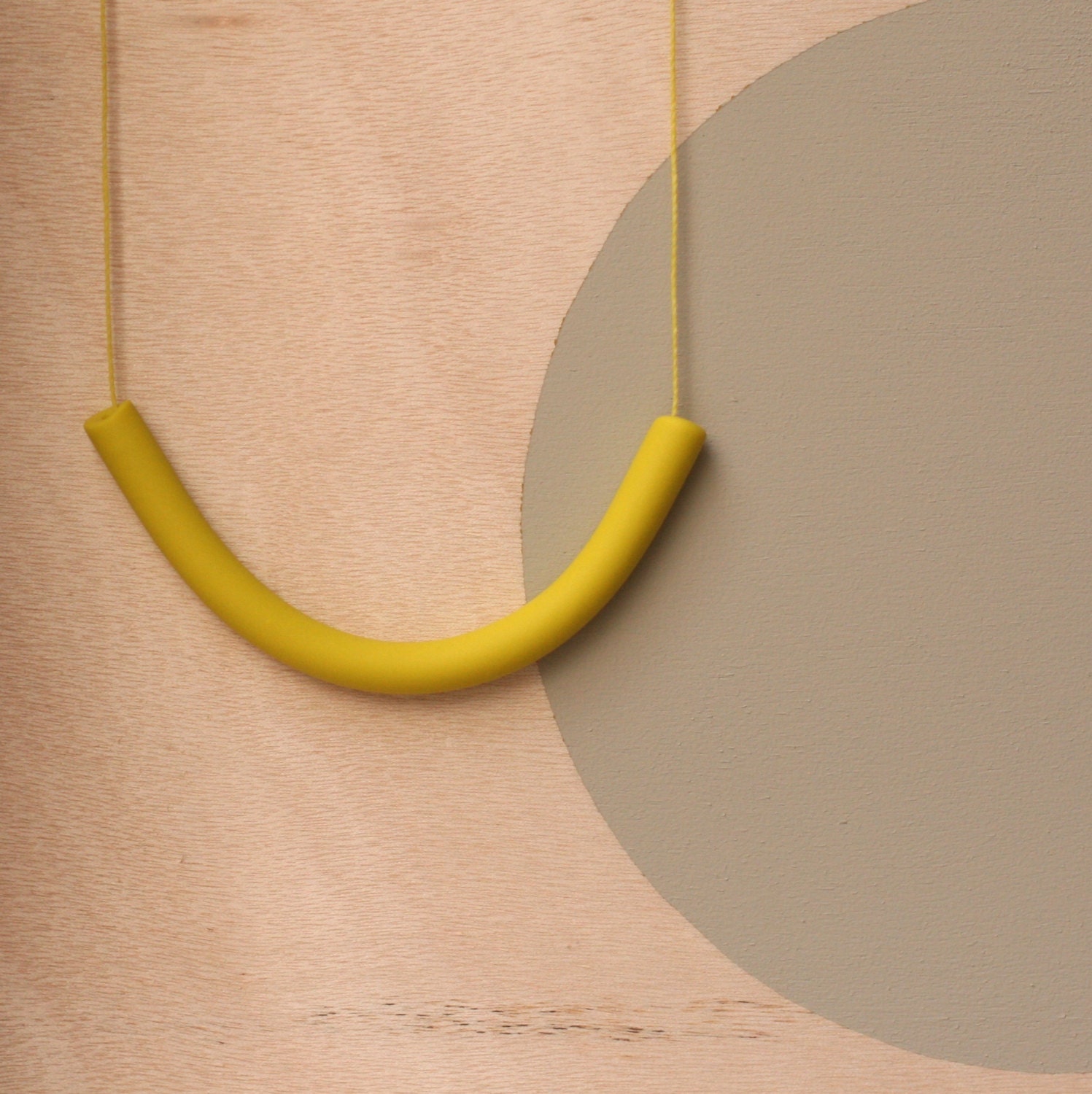 not quite a semi circle makes a necklace