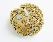 Vintage Orange Rhinestone Swirl Dome Brooch 50s
