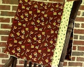 Brown Baby Blanket with  Houses, Canoes, and Cacti