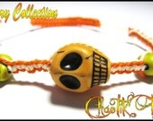 Orange and Yellow Skull Bead Bracelet