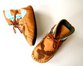 Children's handmade leather beaded wool-lined moccasin winter boots with wool felt insole and crepe rubber sole