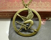 Hunger Games Inspired Necklace- Antique Bronze Mockingjay Bird Katniss Quiver Arrow Double-Sided Pendant, minimalist kitschy rockabilly