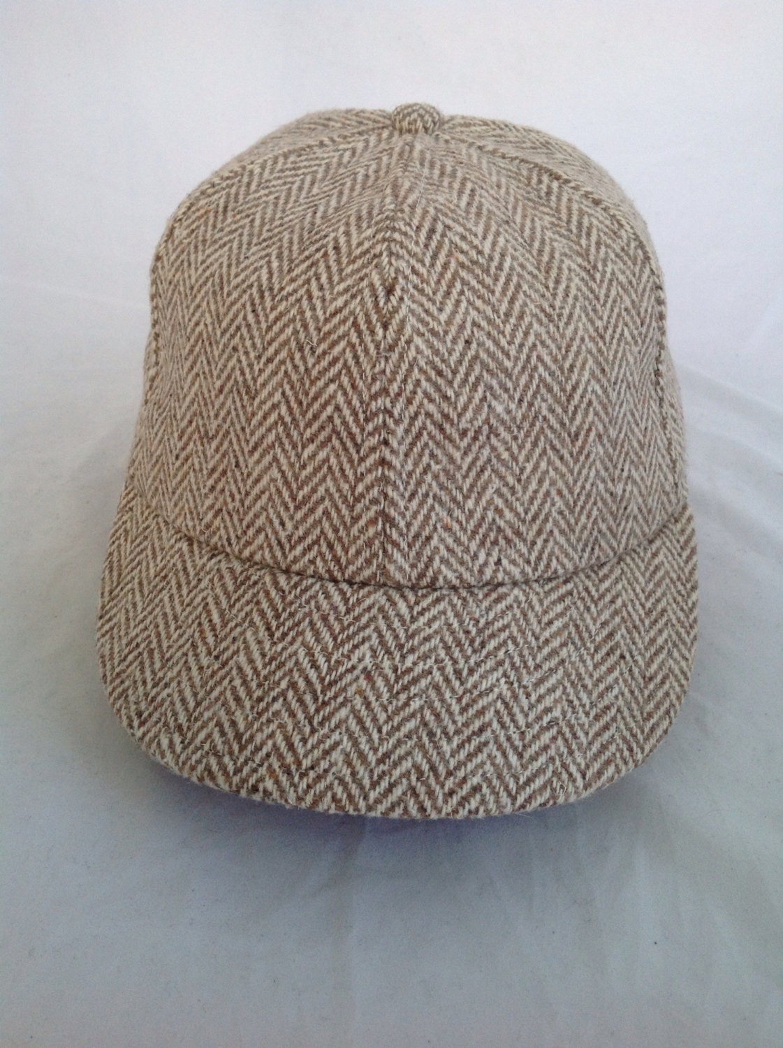 Herringbone wool cap with soft cotton sweatband, size 7 1/4, other sizes available.
